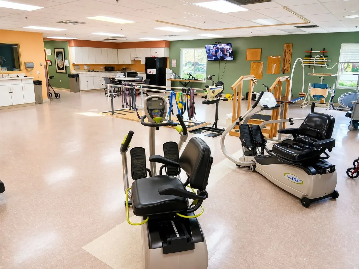 The therapy gym at Vivo Healthcare West Orange, cardio equipment along the near wall